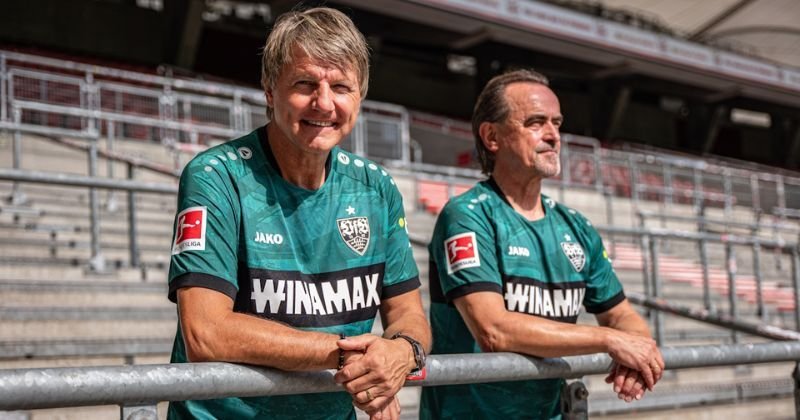 fans wearing vfb stuttgart 2023-24 third shirt in green